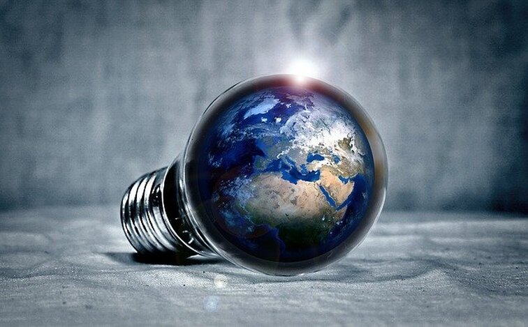 light bulb with planet inside