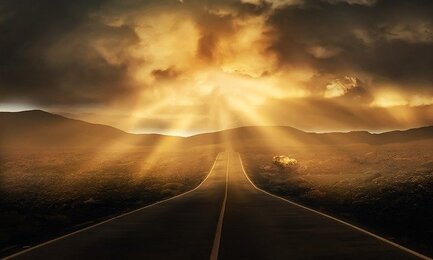 Open road with sun casting light